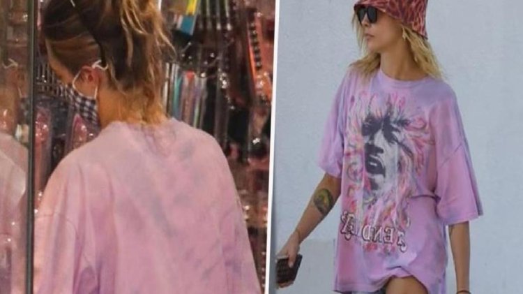 Cinsel ilişki ürünlerinin satıldığı mağazaya giren Cara Delevingne’ın bacağındaki morluklar dikkat çekti