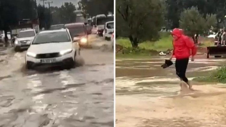 İzmir’de sağanak yağış caddeleri göle çevirdi! Vatandaşlar sudan geçmek için ayakkabı ve çoraplarını çıkardı